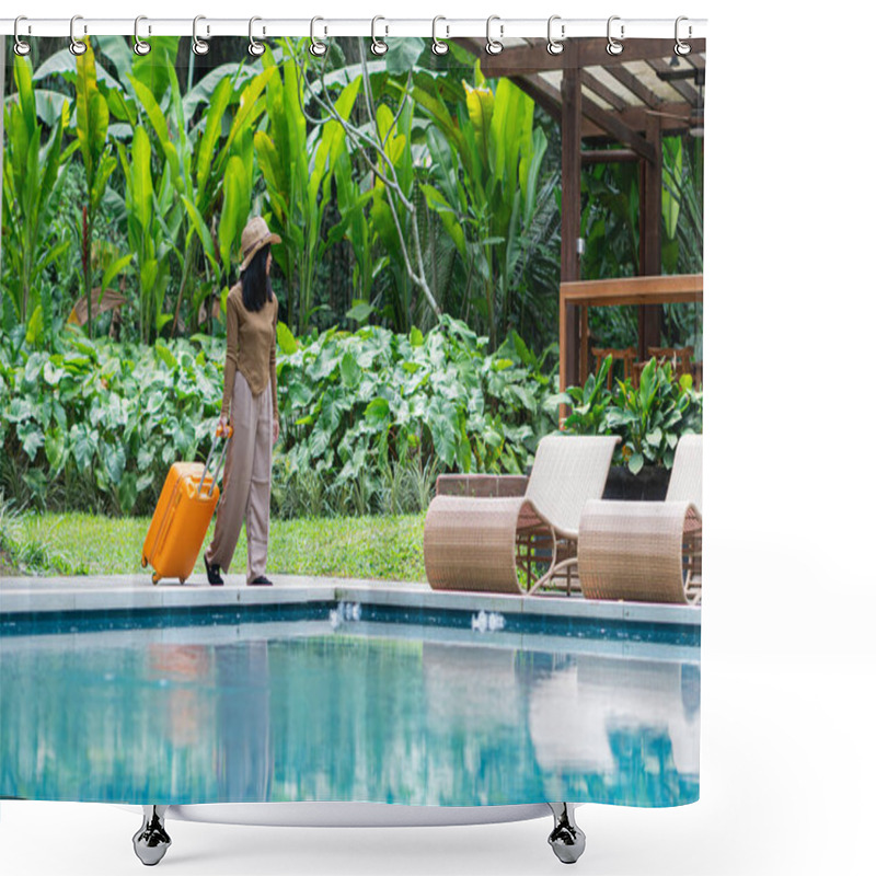 Personality  A Woman Walking By A Poolside With An Orange Suitcase, Wearing A Hat And Stylish Outfit. The Background Features Lush Greenery And A Wooden Structure, Creating A Tropical Vacation Vibe. Shower Curtains