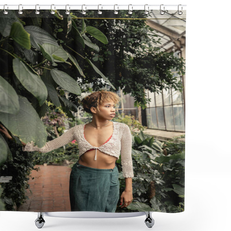 Personality  Confident Young African American Woman In Summer Knitted Top And Skirt Looking Away While Standing Near Green Plants With Foliage In Blurred Garden Center, Fashion-forward Lady In Tropical Oasis Shower Curtains