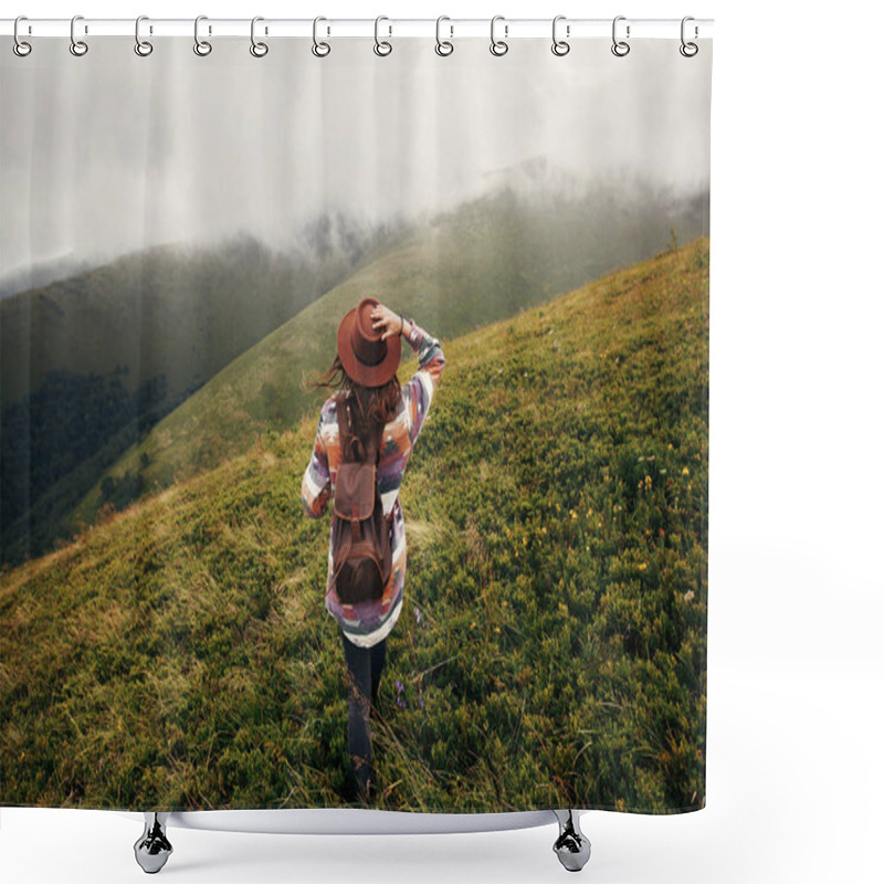 Personality  Stylish Traveler Girl In Hat With Backpack Looking At Sunny Mountains In Clouds. Summer Vacation. Travel And Wanderlust Concept. Space For Text. Back View. Amazing Atmospheric Moment Shower Curtains