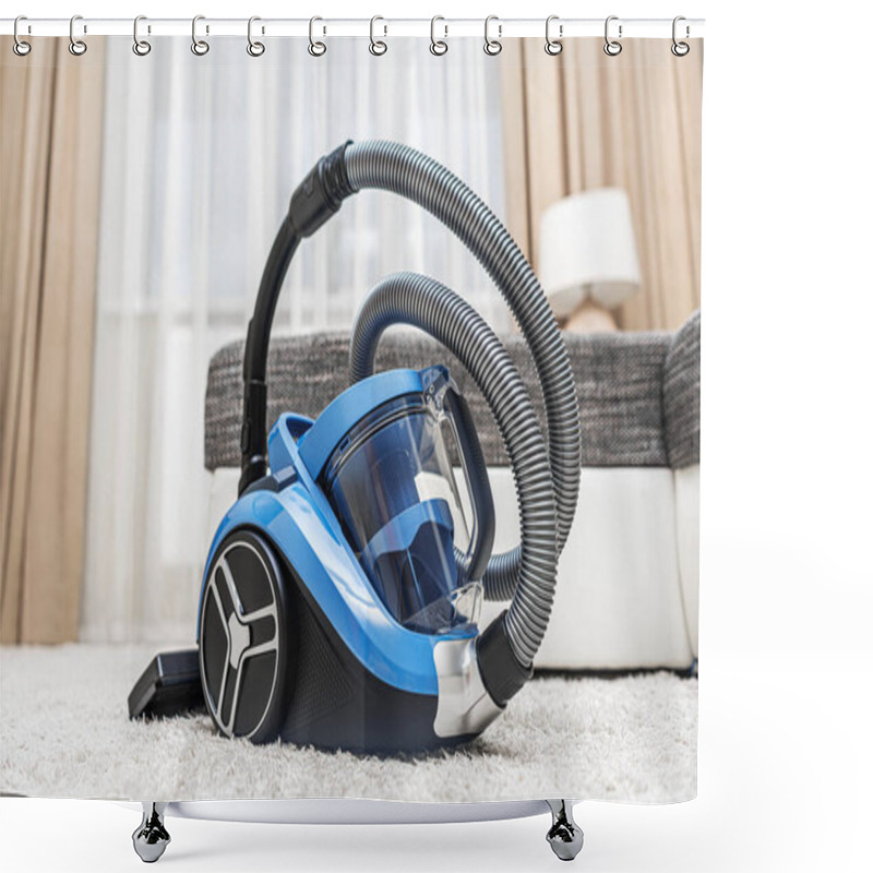 Personality  Modern Vacuum Cleaner In The Living Room. Vacuum Cleaner On The Background Of The Home Interior. Shower Curtains