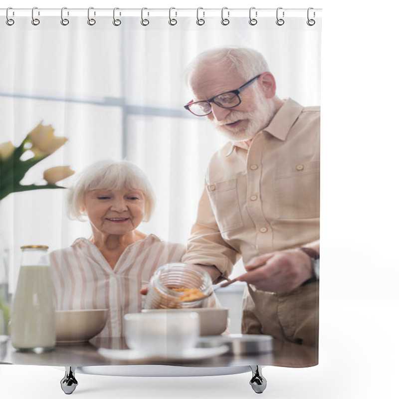 Personality  Selective Focus Of Smiling Elderly Woman Looking At Husband Pouring Cereals In Bowl Near Coffee  Shower Curtains