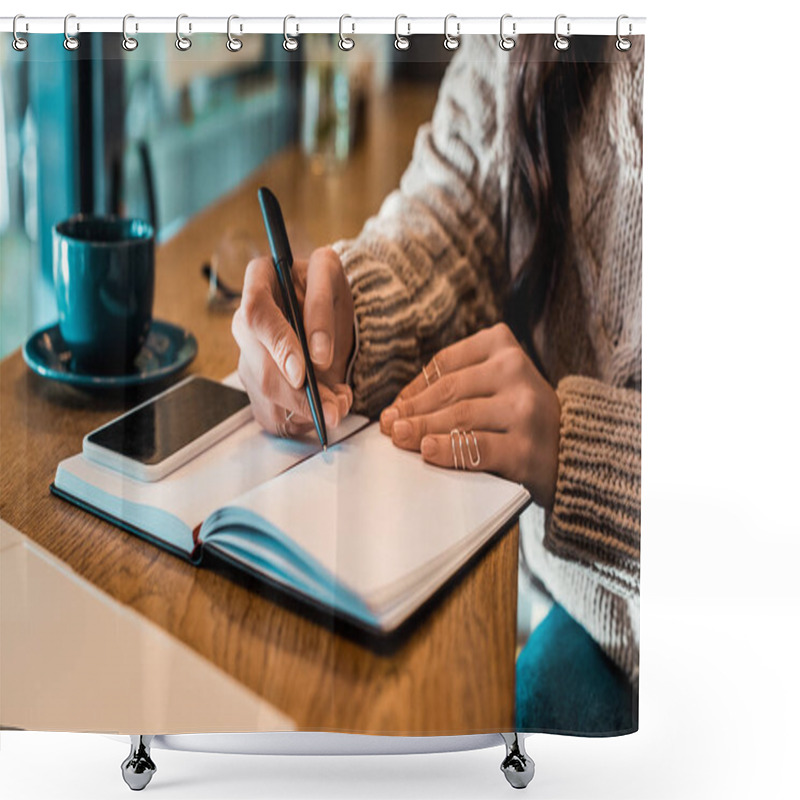 Personality  Cropped View Of Freelancer Writing In Planner With Smartphone In Cafe  Shower Curtains