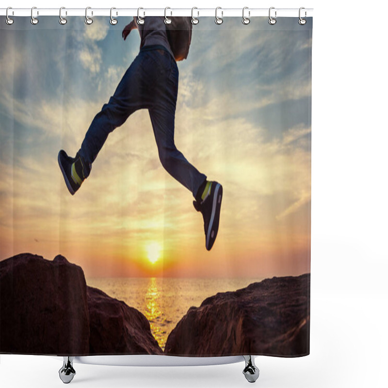 Personality  Young Brave Man With Backpack Jumping Over The Rocks Near The Sea In Sunset Shower Curtains