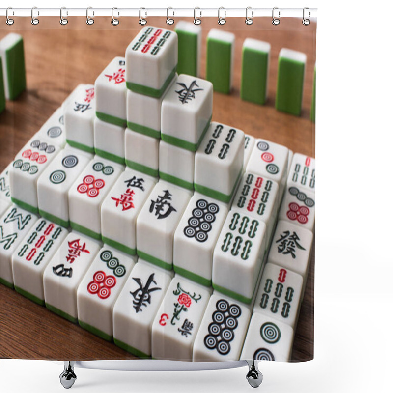 Personality  KYIV, UKRAINE - JANUARY 30, 2019: Rows And Pyramid Made Of Mahjong Game Tiles On Wooden Table Shower Curtains