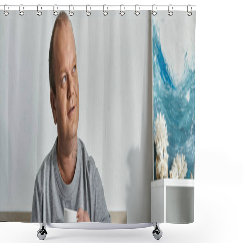 Personality  A Man With Inclusivity Sits In A Room, Holding A Cup, And Looks Up, Lost In Thought, With A Painting Of Crashing Waves In The Background. Shower Curtains