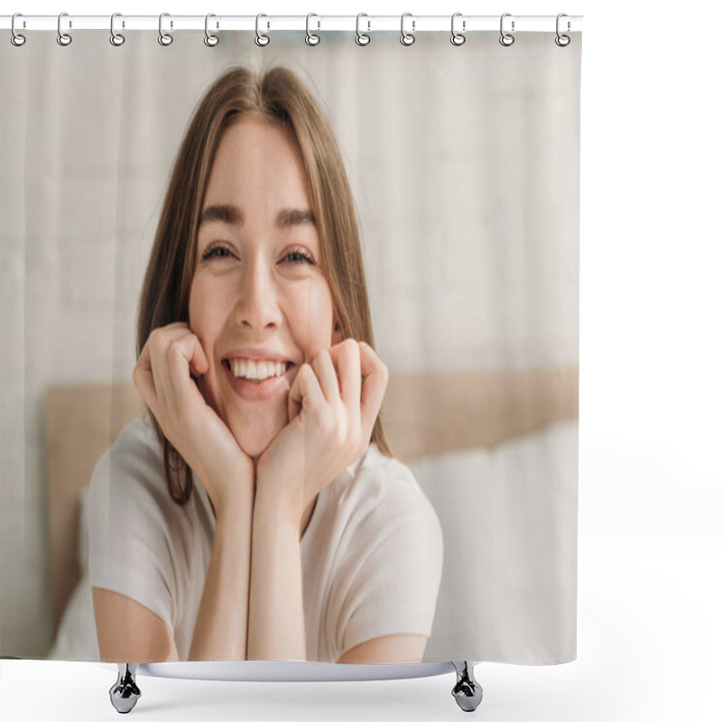 Personality  Cheerful Young Woman Laughing At Camera While Holding Hands Near Face Shower Curtains