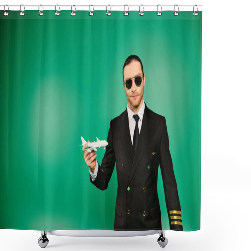 Personality  Handsome Man In Black Suit And Sunglasses Holding Model Airplane Over Green Backdrop. Shower Curtains