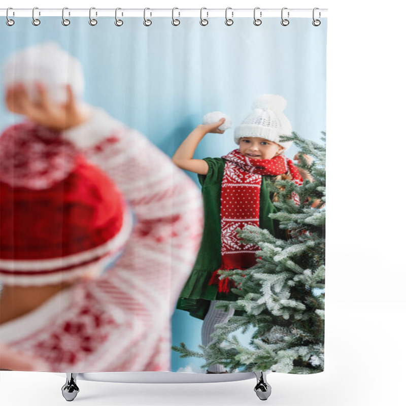 Personality  Selective Focus Of Girl In Hat And Scarf Holding Snowball While Playing With Brother On Blue  Shower Curtains