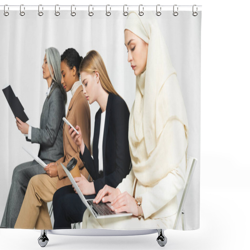 Personality  Side View Of Multicultural Businesswomen Sitting On Chairs With Gadgets Isolated On White  Shower Curtains