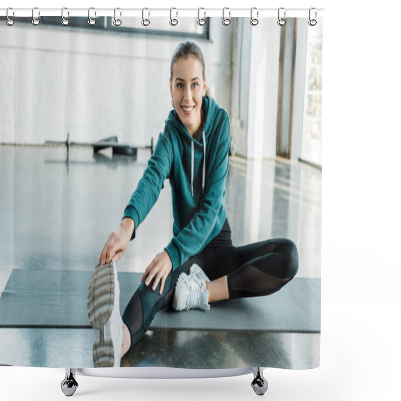 Personality  Smiling Sportswoman Sitting On Mat, Looking At Camera And Doing Stretching Exercise At Gym  Shower Curtains