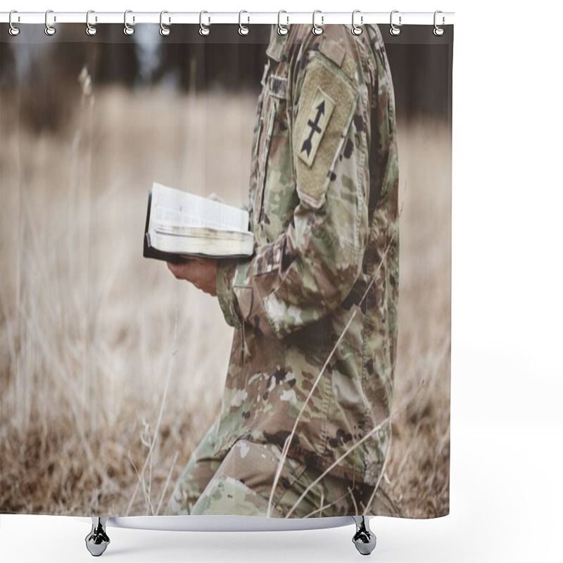 Personality  A Shallow Focus Shot Of A Young Soldier Kneeling While Holding An Open Bible In A Field Shower Curtains