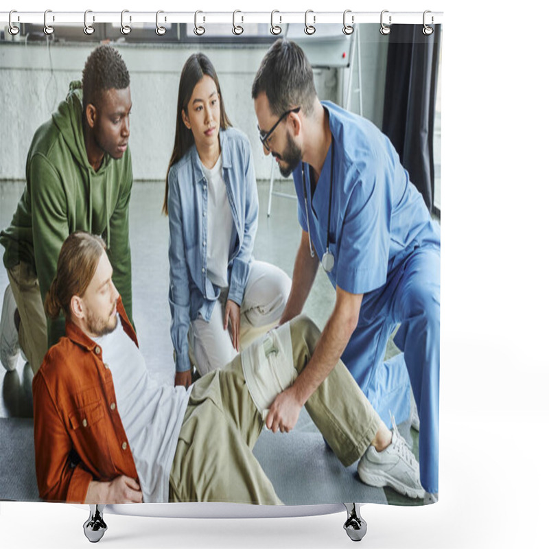 Personality  Healthcare Worker Applying Compressive Bandage On Leg Of Man Near Interracial Participants During First Aid Seminar In Training Room, Bleeding Prevention Techniques Concept Shower Curtains