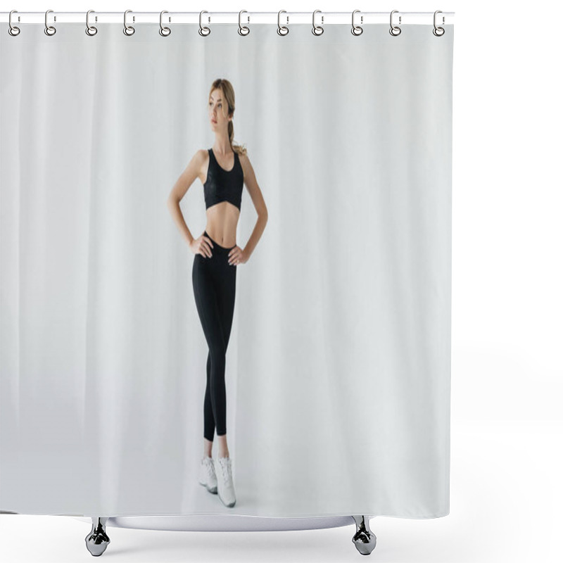 Personality  Beautiful Sportswoman Akimbo In Black Sportswear Standing Isolated On Grey Shower Curtains