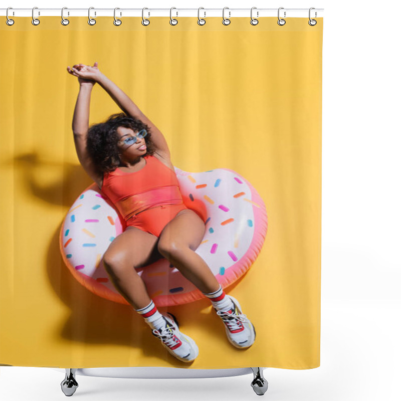 Personality  Top View Of African American Woman In Swimsuit And Sneakers Sitting On Swim Ring On Yellow Background Shower Curtains