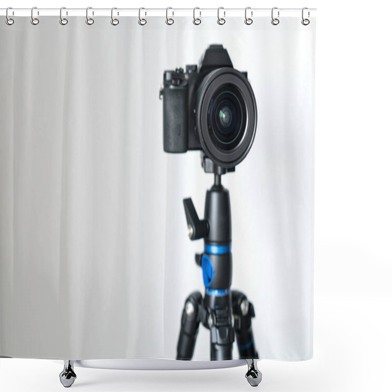 Personality  Professional Black Mirrorless Camera Stands On A Tripod Against A White Wall. Blogging And Video Photo Shooting. Shower Curtains