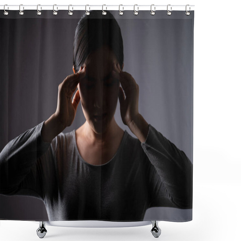 Personality  Asian Woman Was Sick With Headache Touching Her Head And Standing Isolated On Background. Low Key. Shower Curtains