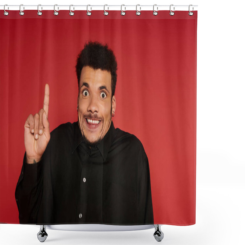 Personality  A Young Handsome Man Shows Excitement With A Raised Finger In Front Of A Red Background. Shower Curtains