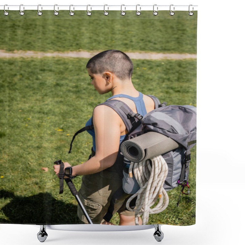 Personality  Side View Of Young Short Haired And Tattooed Female Hiker With Backpack And Fitness Tracker Holding Trekking Pole While Walking On Grassy Lawn At Background, Solo Hiking Journey Concept  Shower Curtains