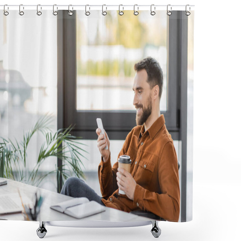 Personality  Happy And Successful Bearded Businessman With Takeaway Drink Messaging On Mobile Phone Near Notebook, Laptop, Decorative Plants And Large Windows In Office Shower Curtains