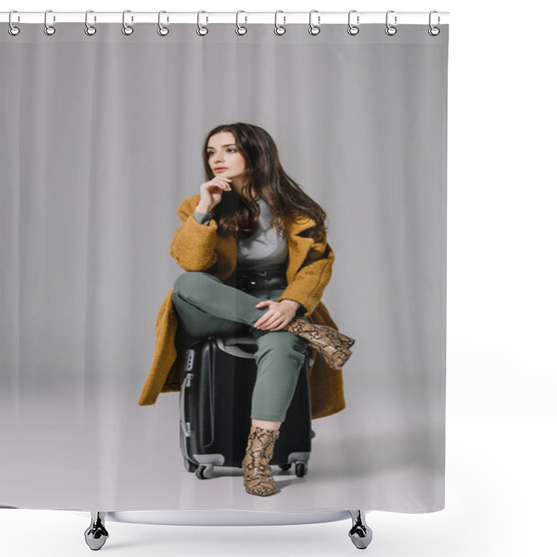 Personality  Beautiful Pensive Woman In Beige Coat Sitting On Travel Bag On Grey Shower Curtains