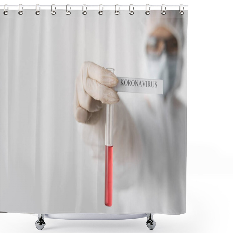 Personality  A Female Doctor In A Protective Suit, Holding A Test Tube In His Hands, The Inscription Coronavirus. Protection Against Infection. Test For The Presence Of A Virus In The Body. Place For Text Shower Curtains