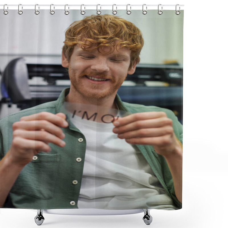 Personality  Smiling Young Redhead Craftsman Holding Layer With I'm Ok Lettering While Working Near Screen Printing Machine In Workshop, Small Business Owner Working On Project  Shower Curtains