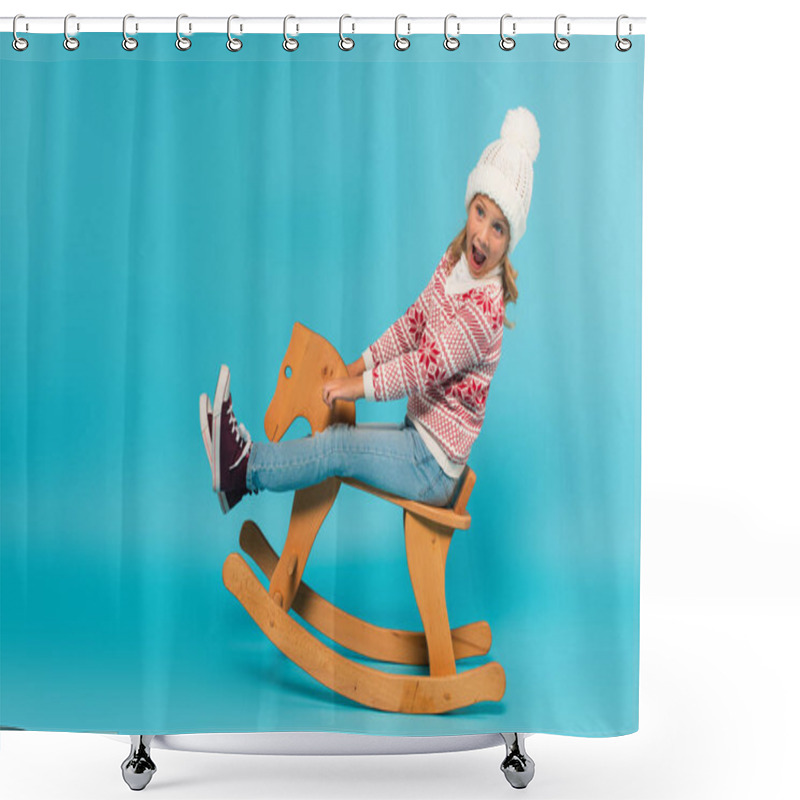 Personality  Amazed Kid In Sweater And Hat Screaming While Riding Rocking Horse On Blue Shower Curtains