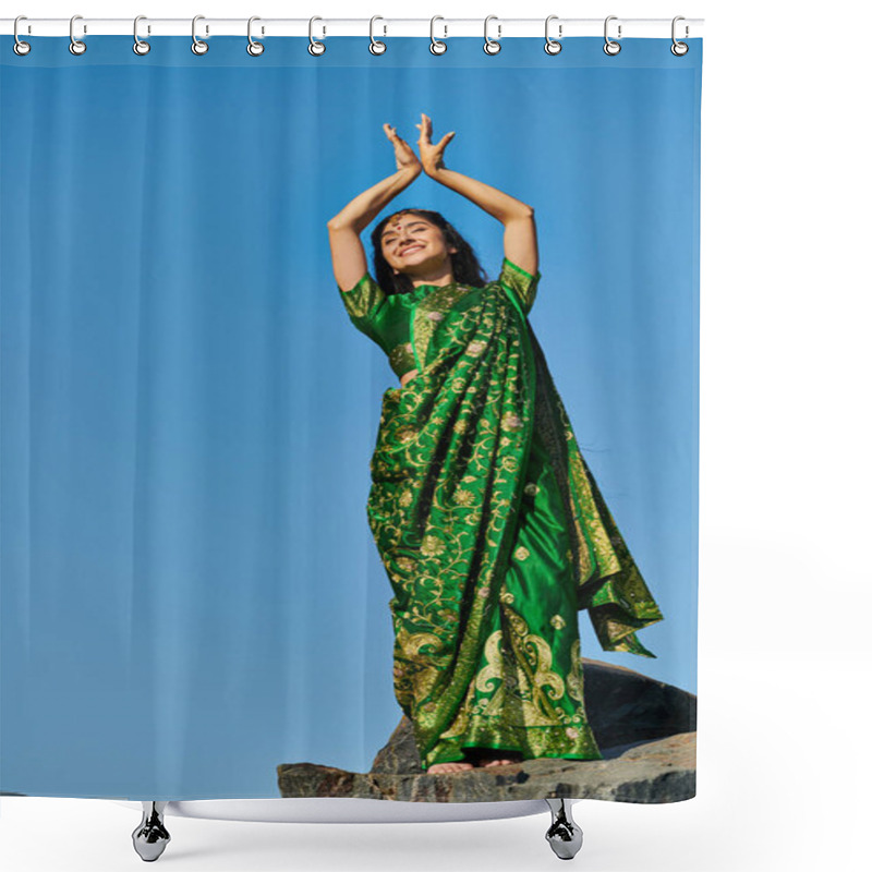 Personality  Low Angle View Of Smiling Indian Woman In Sari Posing While Standing On Stone With Sky On Background Shower Curtains