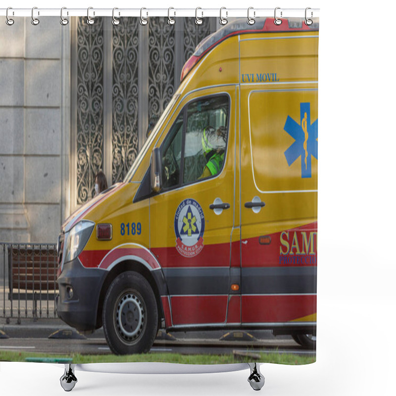 Personality  Madrid, Spain - May 19, 2020: An Advanced Life Support Unit USVA, Part Of The SAMUR-Civil Protection Vehicle And Ambulance Park, As It Passes Through Alcala Street With Cibeles. Shower Curtains