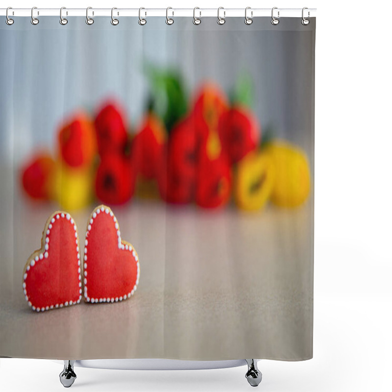 Personality  Heart-shaped Cookies With Tulip Bouquet Background. Two Red Heart-shaped Cookies With White Icing Are Displayed On A Tabletop, With A Blurred Bouquet Of Red And Yellow Tulips Behind Them Shower Curtains