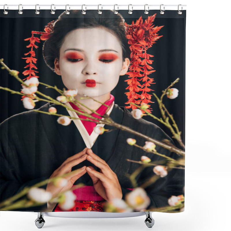 Personality  Selective Focus Of Beautiful Geisha In Black Kimono With Red Flowers In Hair Looking At Sakura Branches Isolated On Black Shower Curtains