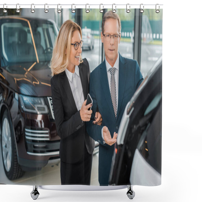 Personality  Businessman And Smiling Businesswoman With Smartphone Choosing New Car In Dealership Salon Shower Curtains