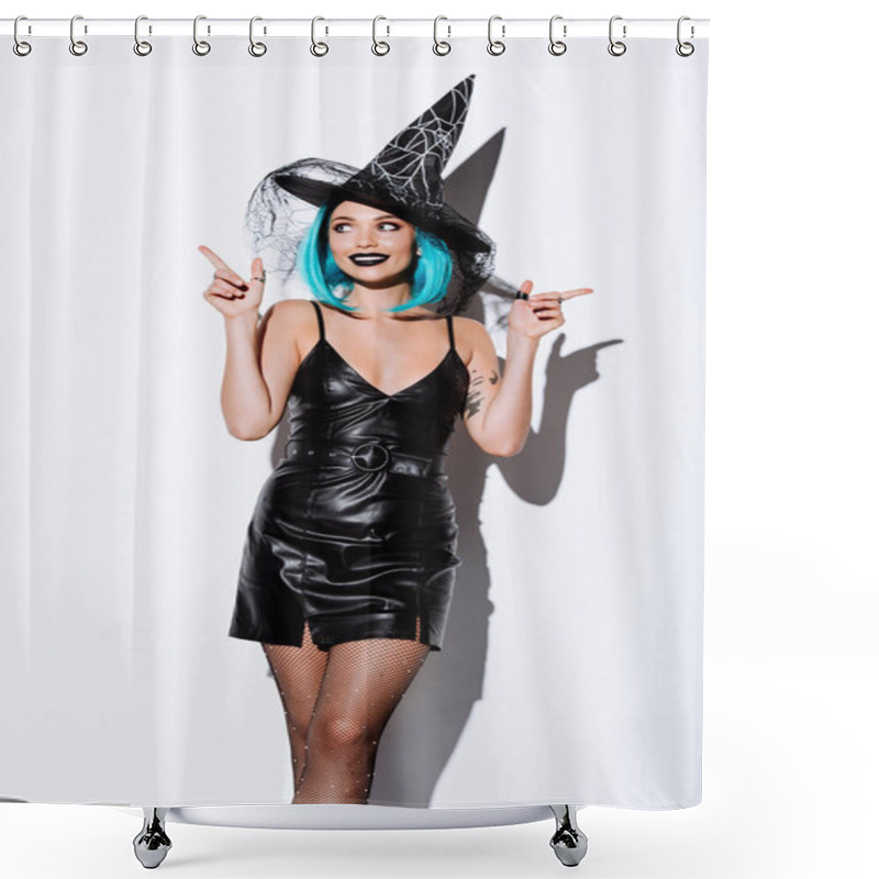 Personality  Smiling Girl In Black Witch Halloween Costume With Blue Hair Pointing With Hands On White Background Shower Curtains