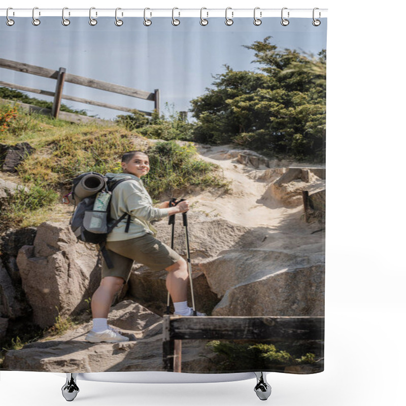 Personality  Positive Young Short Haired Female Traveler With Backpack Holding Trekking Poles And Standing Near Hill With Stones At Background During Summer, Translation Of Tattoo: Love Shower Curtains