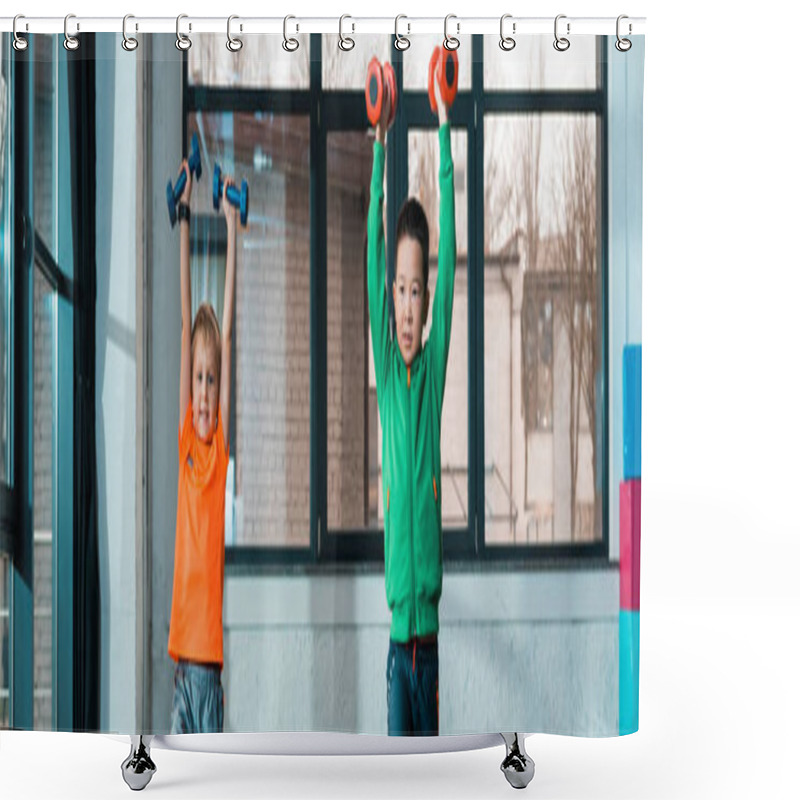 Personality  Front View Of Multicultural Kids Raising Hands With Dumbbells While Doing Exercise In Gym, Panoramic Shot Shower Curtains