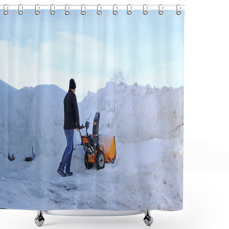 Personality  A Man With A Snow Blower Clears High Snow Shower Curtains