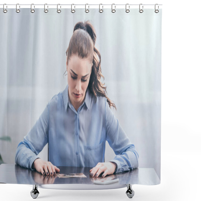 Personality  Upset Woman In Blue Blouse Sitting At Wooden Table With Smartphone And Looking At Photo In Room, Grieving Disorder Concept Shower Curtains