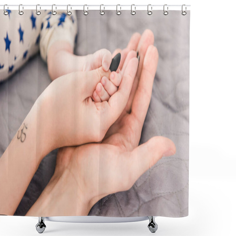 Personality  Cropped Shot Of Parents Holding Babys Hand Together Shower Curtains