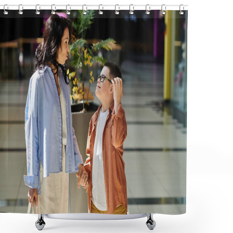 Personality  A Mother And Her Son With Down Syndrome Walk Hand-in-hand Through A Shopping Mall, Enjoying A Day Out Together. Shower Curtains