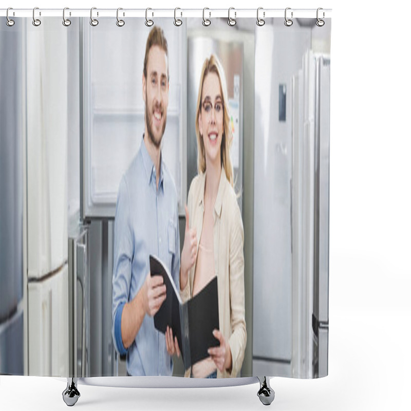 Personality  Panoramic Shot Of Smiling Consultant Holding Folder And Woman Showing Like In Home Appliance Store  Shower Curtains