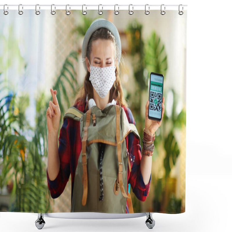 Personality  Travel During Covid-19 Pandemic. Happy Young Student With Crossed Fingers, Smartphone, Covid Passport App, White Medical Mask, Backpack And Hat In The Modern House In Sunny Day. Shower Curtains