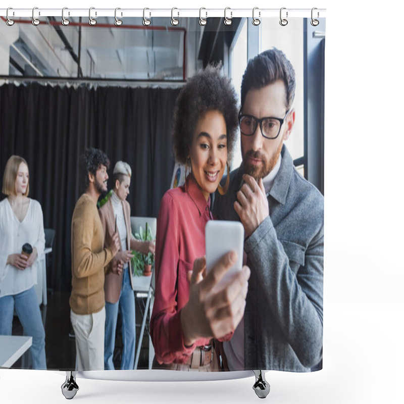 Personality  Smiling African American Woman Showing Smartphone To Thoughtful Colleague In Ad Agency Shower Curtains