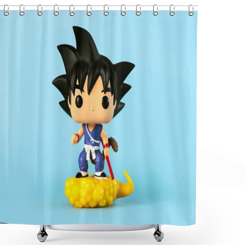 Personality  Funko POP Vinyl Figure Of Son Goku & Flying Nimbus Character Of The Dragon Ball Z Manga Series Created By Akira Toriyama Over Blue Background. Illustrative Editoria Shower Curtains