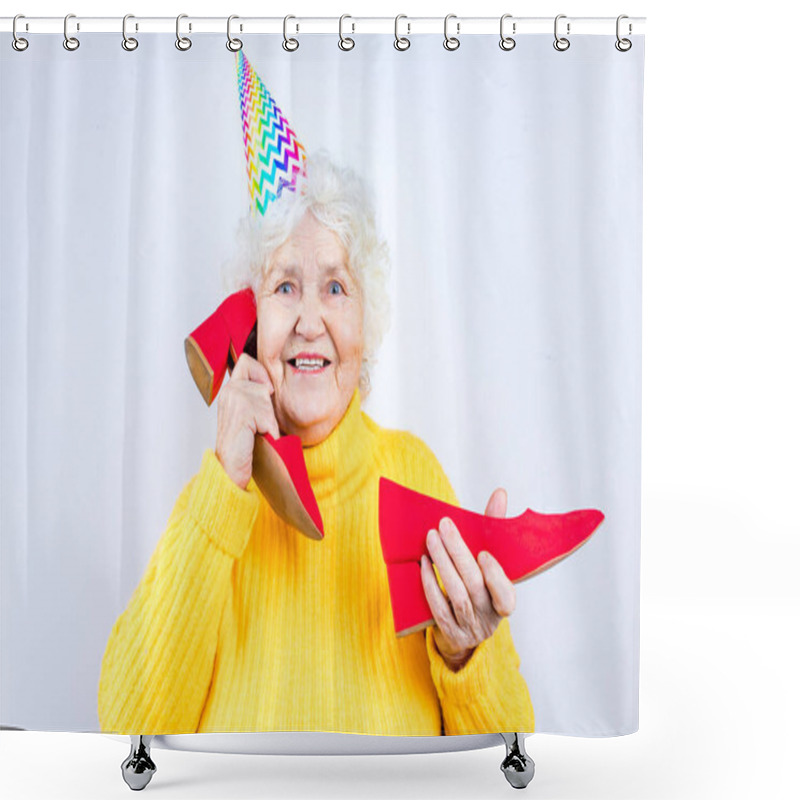 Personality  Older Woman With A Gift Wear Yellow Sweater And Horn Cap On A White Background Holding Red High Heels Shoes Shower Curtains