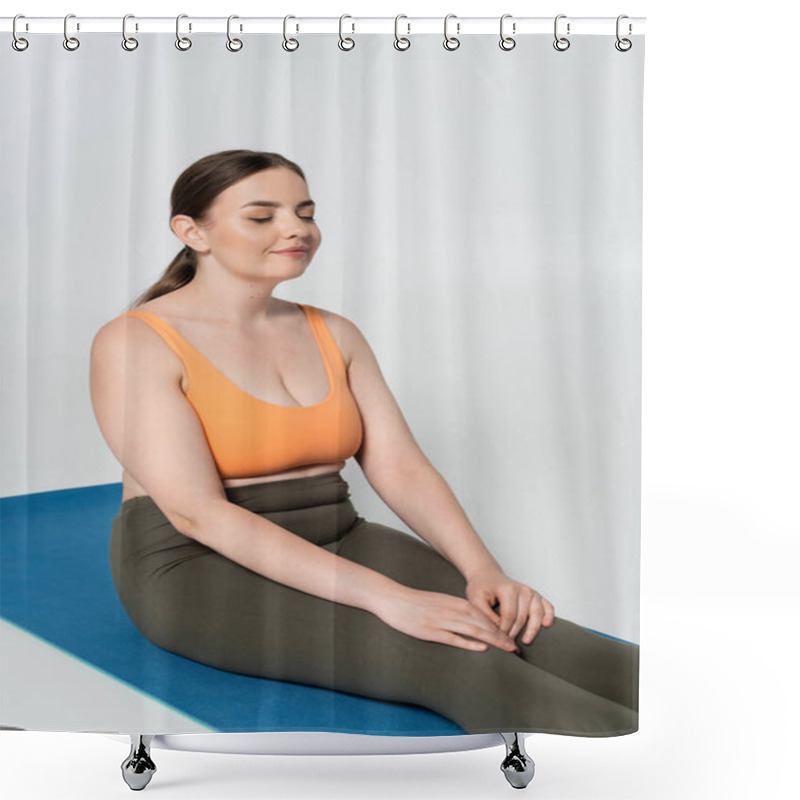 Personality  A Strong And Fit Woman Engages In Meditation, Finding Peace In A Spacious Fitness Environment. Shower Curtains