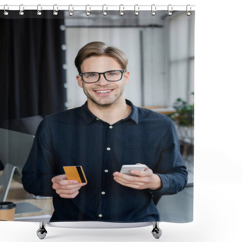 Personality  Smiling Developer Holding Credit Card And Cellphone While Looking At Camera In Office  Shower Curtains