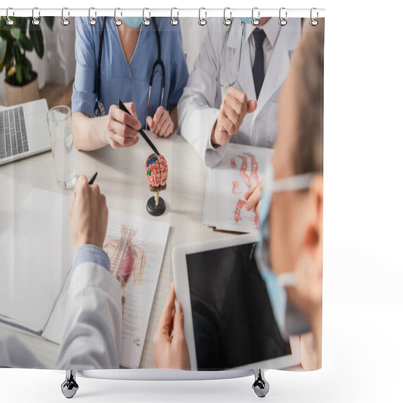 Personality  Nurse Pointing With Pen At Brain Anatomical Model Near Multiethnic Colleagues At Workplace With Pictures And Devices On Blurred Foreground Shower Curtains