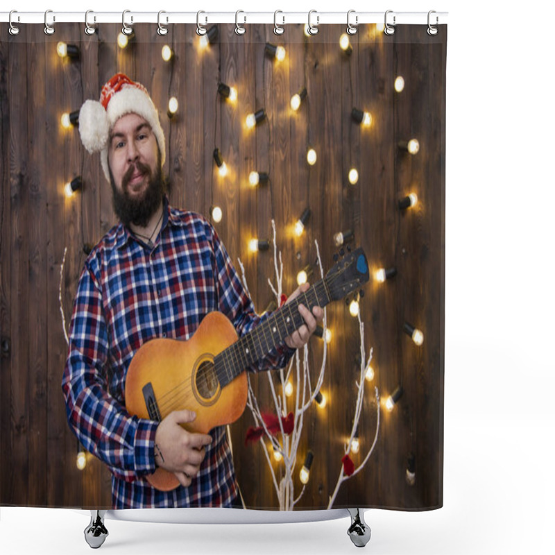 Personality  Smile Bearded Man Portrait With Guitar In Christmas Hat Stylish Studio Room Decorative Tree And Garland Lamps Yellow Lights Background  Shower Curtains