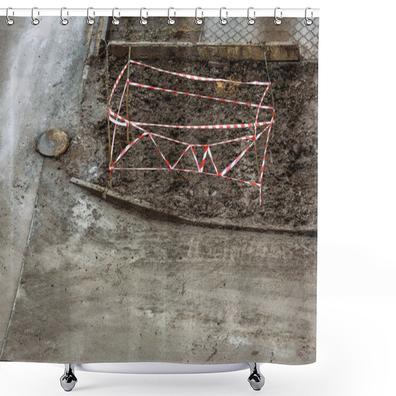 Personality  Excavated Section Of Street With Red And White Safety Tape Marking No-go Area Near Manhole. Dirt And Mud Surround Construction Site On Asphalt City Road Shower Curtains