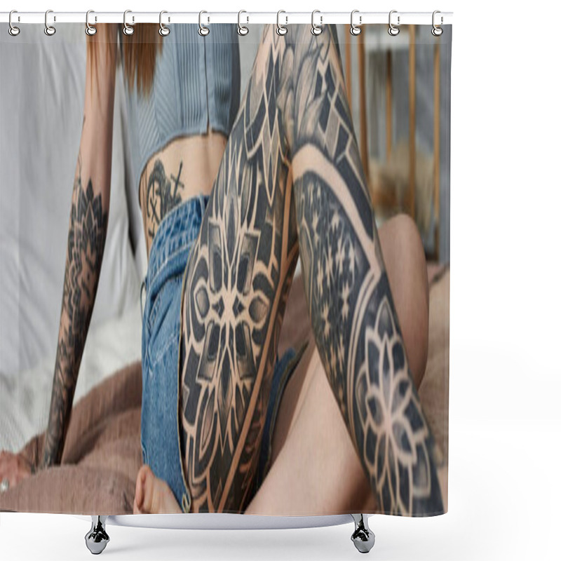 Personality  A Young Woman With Intricate Tattoos On Her Arm And Leg Relaxes On A Bed In A Modern Apartment. Shower Curtains